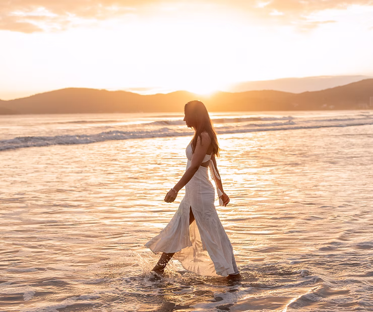 woman walking in ocean