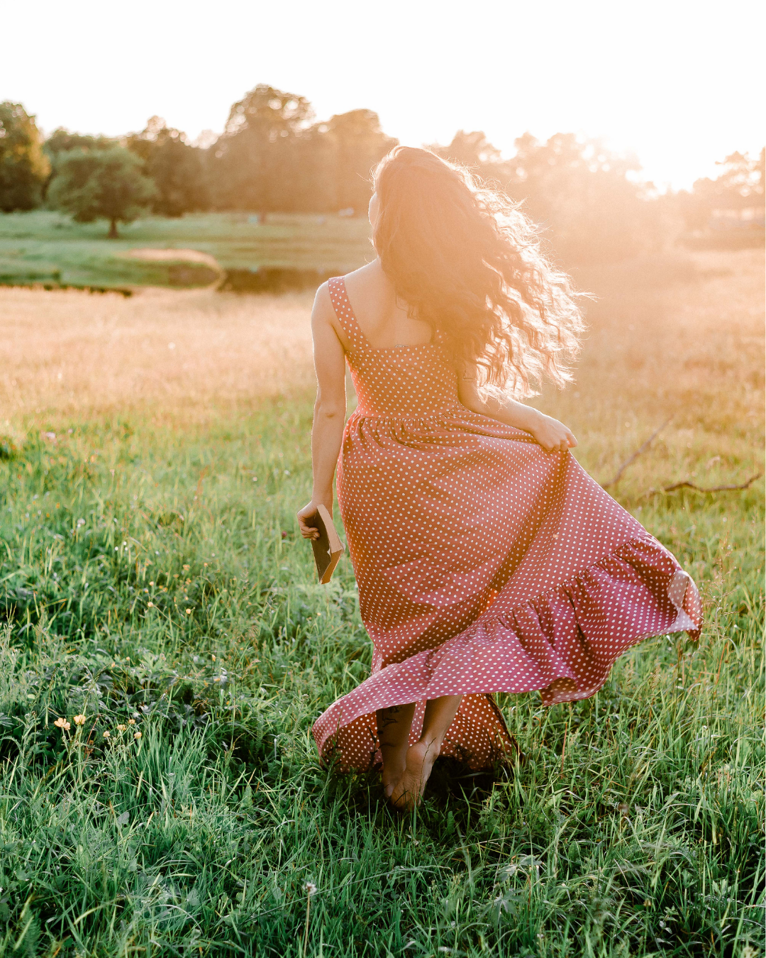Woman walking peacefull in nature with sunlight
